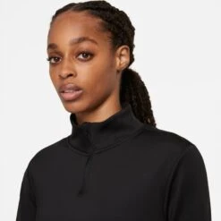 Nike Women's Therma-Fit One Long-Sleeve 1/2 Zip Top (Plus Sizes) - Black (DN2239-010) 10 Nike Women's Therma-Fit One Long-Sleeve 1/2 Zip Top (Plus Sizes) - Black (DN2239-010) -Sports Fashion Store DN2239 010 PHSYM001 JPG HEI 875 WID 875